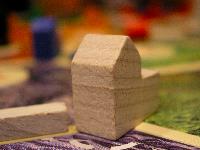 Wooden board game piece