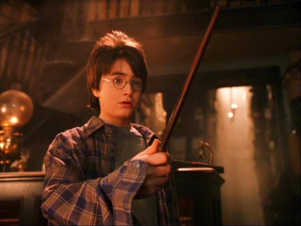 An image of Harry Potter with a wand from a Harry Potter film