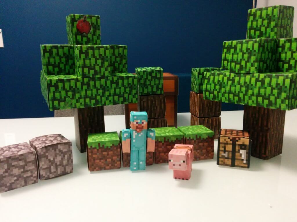 Image of papercraft Minecraft figures in the speech IRL office